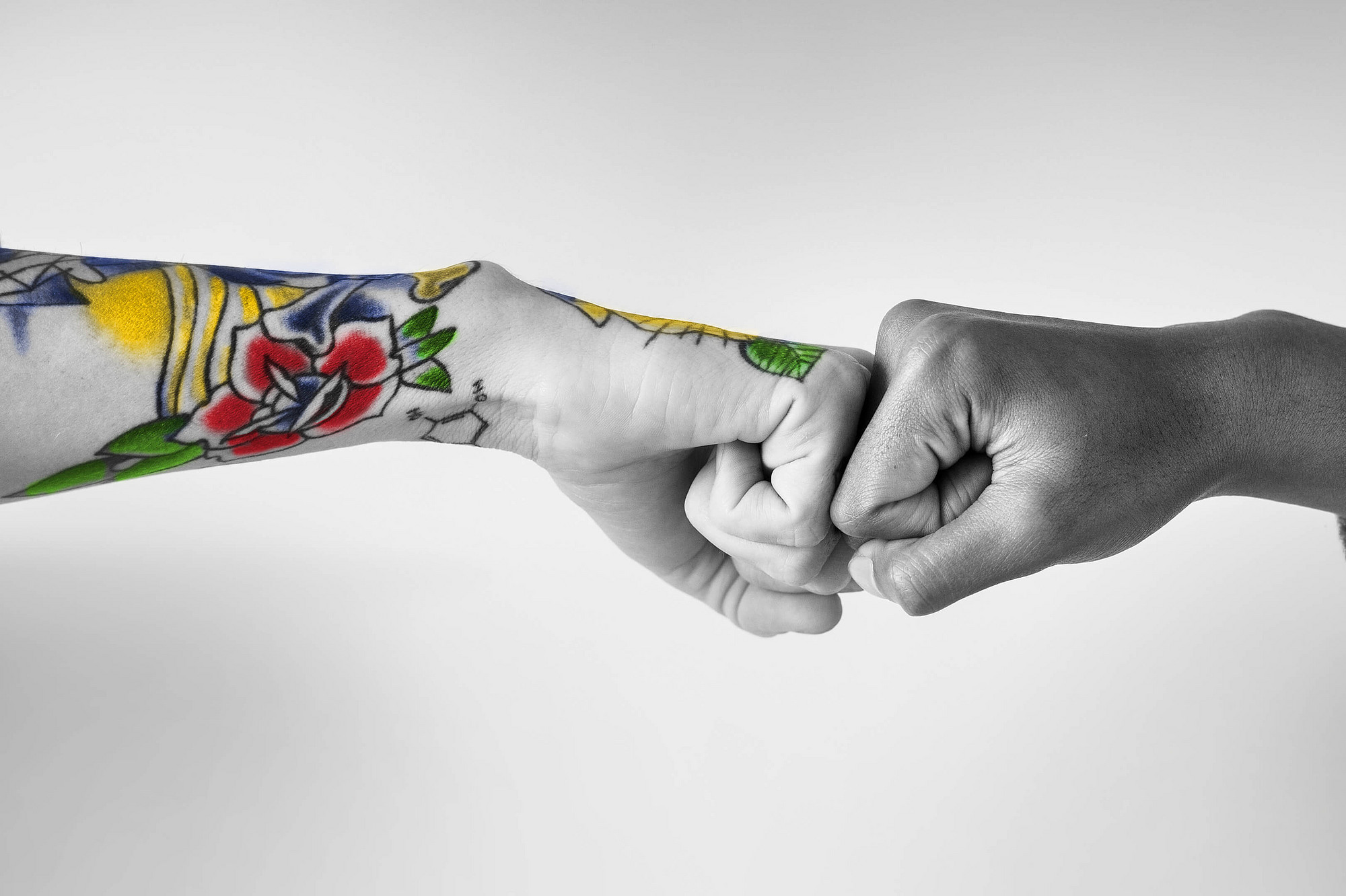 Fistbump (rawpixel | iStock)